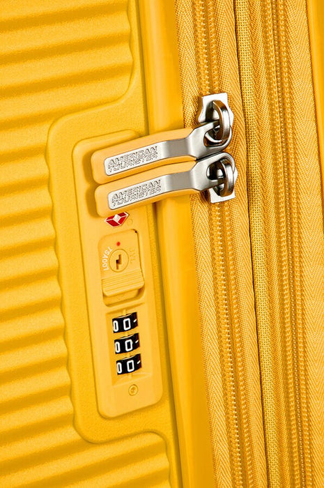 Голям куфар American Tourister Soundbox - златисто жълт