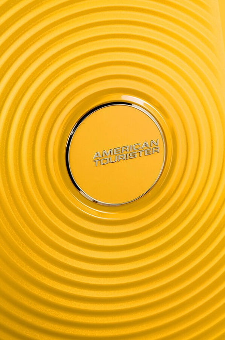 Голям куфар American Tourister Soundbox - златисто жълт
