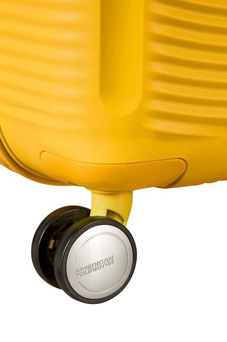 Голям куфар American Tourister Soundbox - златисто жълт