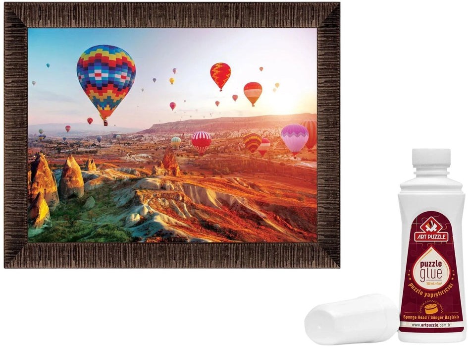 Комплект пъзел, рамка и лепило Art Puzzle от 1000 части - Последните лъчи над Кападокия