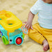 Играчка за дърпане Bright Starts Pop & Roll Safari Bus