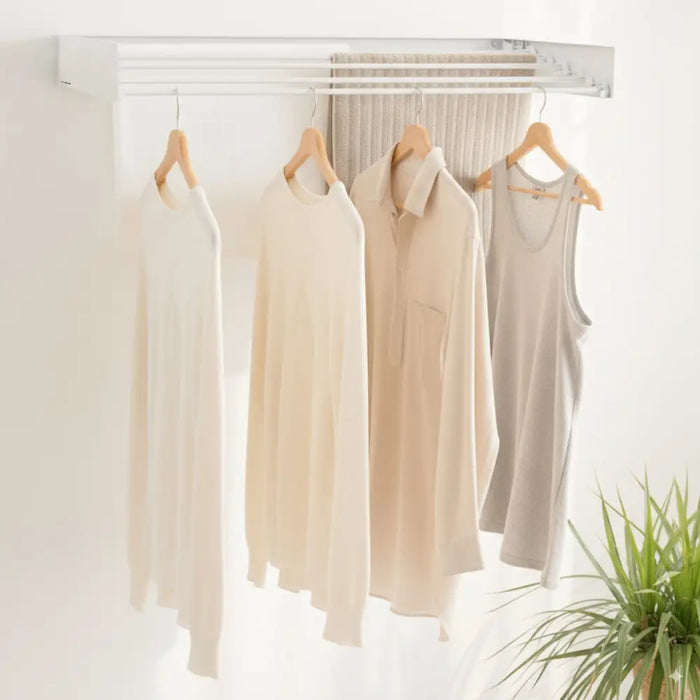 Сгъваем разтегателен прибиращ се стенен сушилник за дрехи